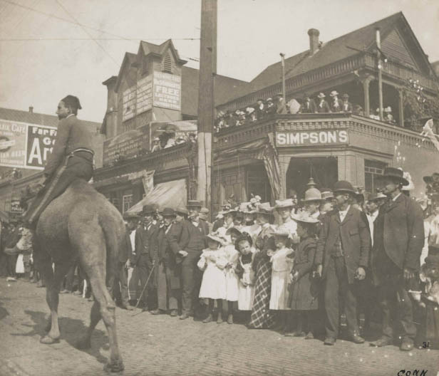 Parade at 2nd Ave. and Marion Street, 1899