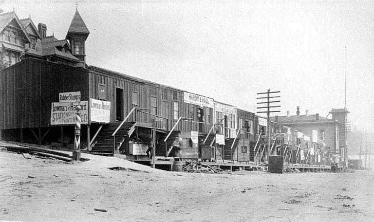 Businesses in temporary buildings on 3rd Ave., looking south from James Street, aftermath of the Seattle Fire of June 6, 1889