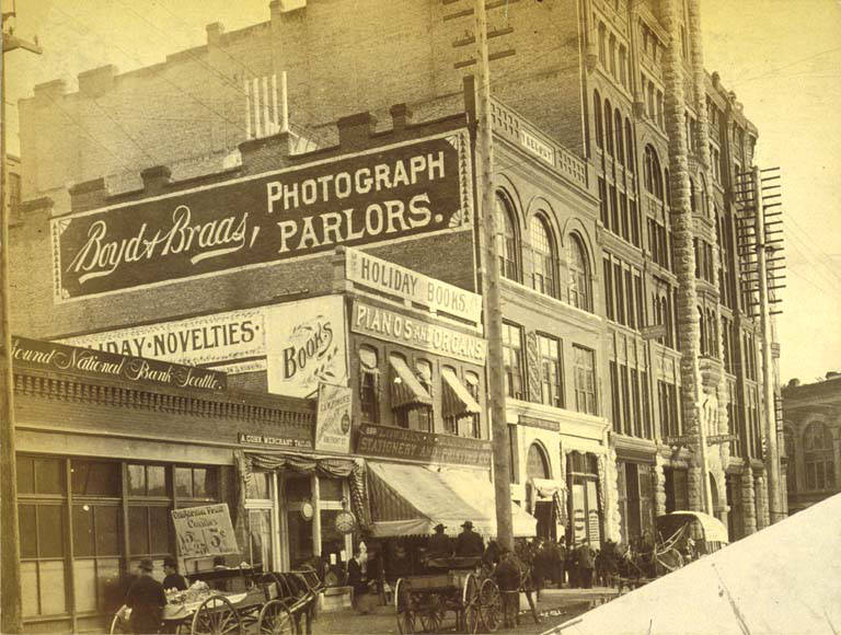 East side of 1st Ave. between James St. and Cherry Street, Seattle, 1890.