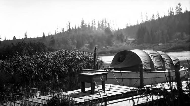 Boat on shore in Bellevue, Washington, 1940