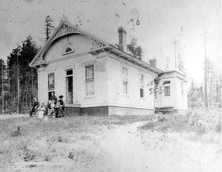 Burrows family gathered on the front porch of their house, Killarney (now Bellevue), 1880