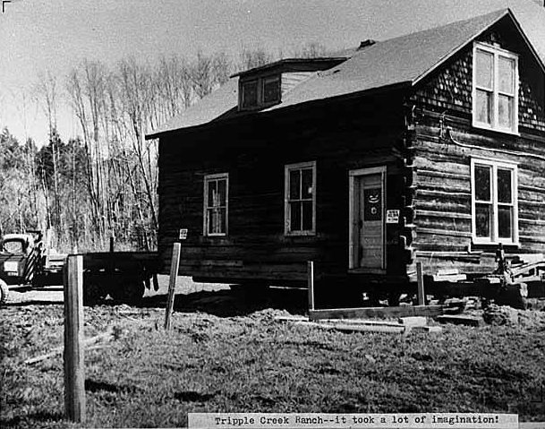 Moving Wilkins log house, Bellevue, 1958