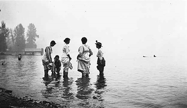 Women and children wading in Meydenbauer Bay, Bellevue, 1912