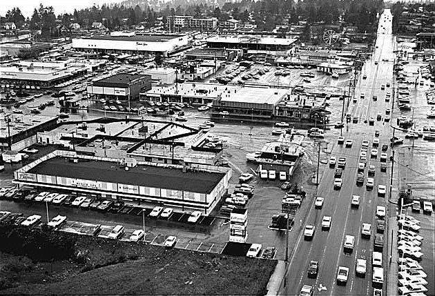 View west, up NE 8th from the air, at about Bellevue Way, 1967.