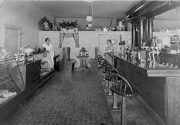 Addie Hurley and Gladys Younger in Charley Younger's Candy Shop, Bellevue, 1930