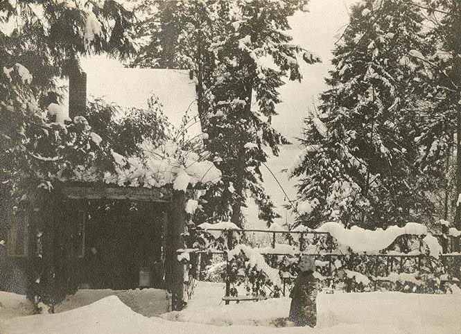 Alfred Renfro, Jr. playing in snow at Beaux Arts Village, 1910