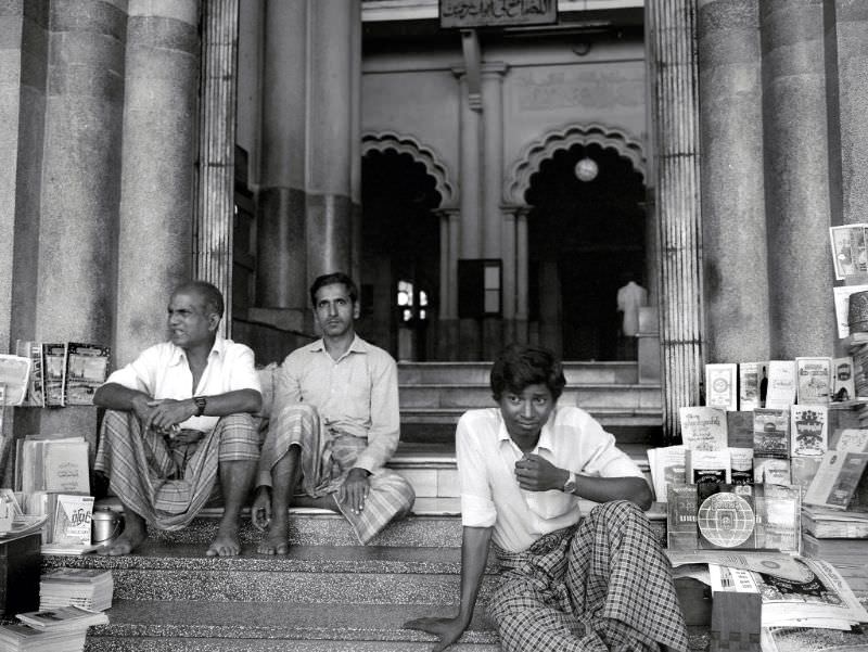 Rangoon. Booksellers on the steps of the Bengali Sunni Jameh Mosque, Sule Pagoda Road, Burma, 1986