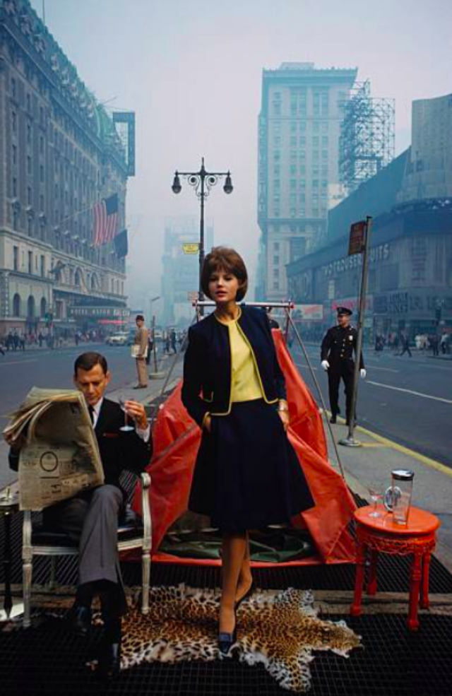 Actor Tony Randall plays house with a model in the middle of Times Square, Manhattan, January 1963