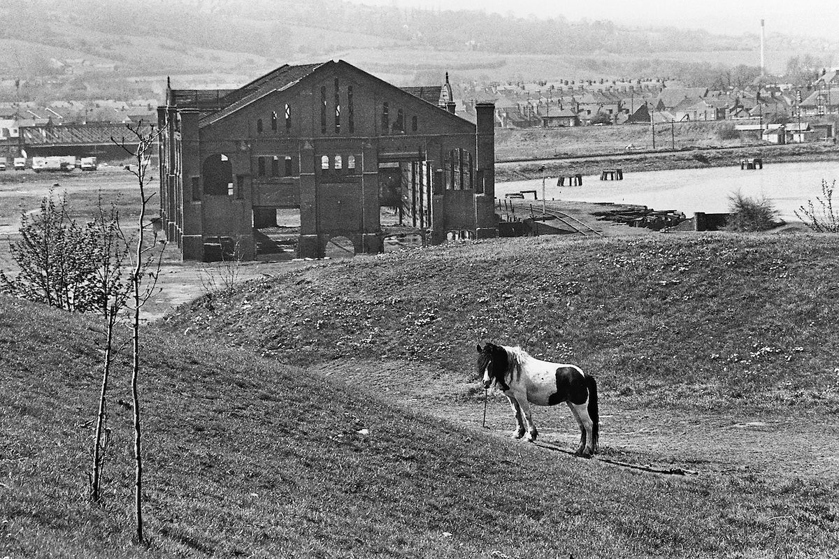 The riverside at Redheugh in 1980, with the old gasworks building before demolition.
