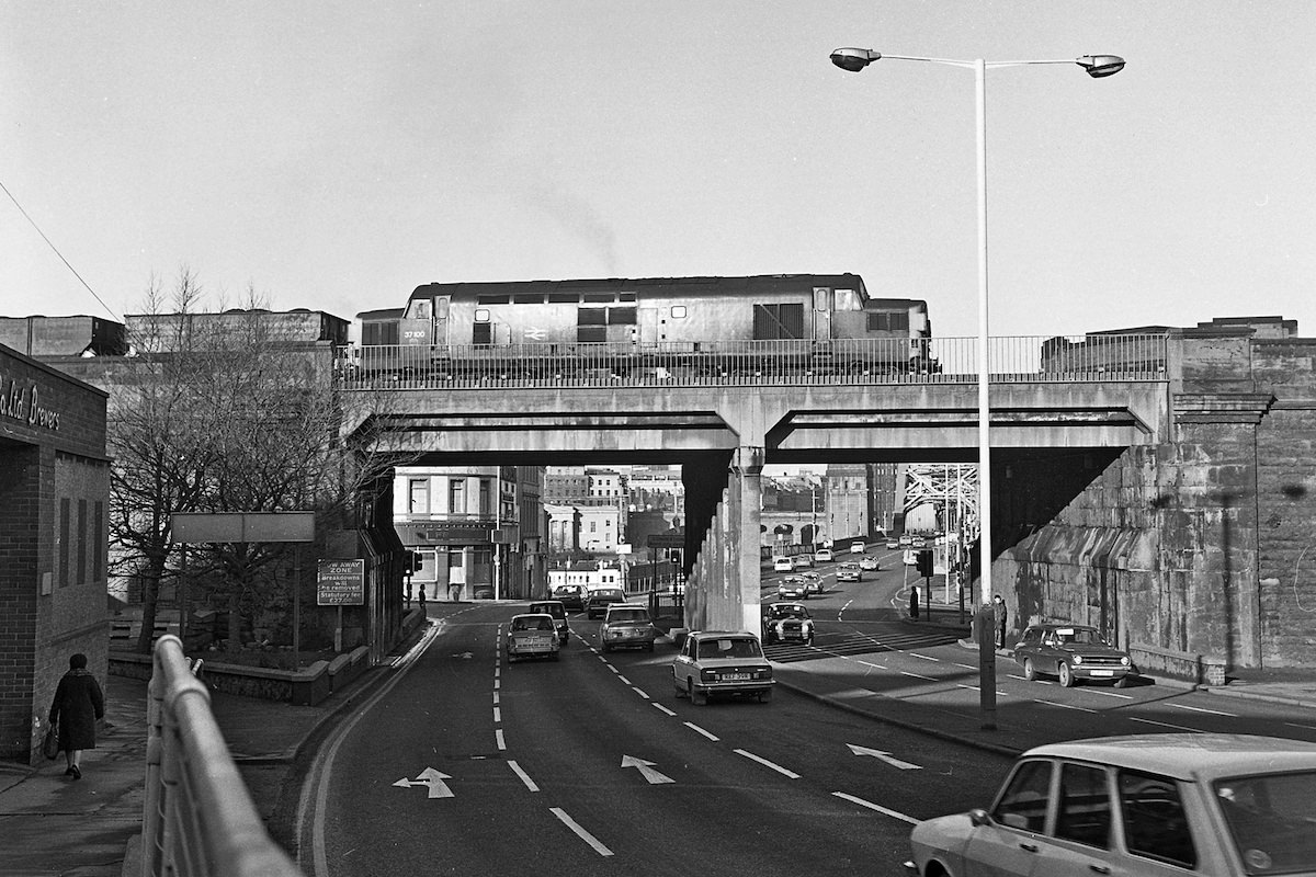 37100 with a coal train crossing the bottom of High Street in 1981