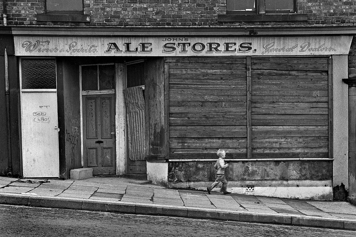 A derelict shop front in Derwentwater Road, Gateshead in September 1980.