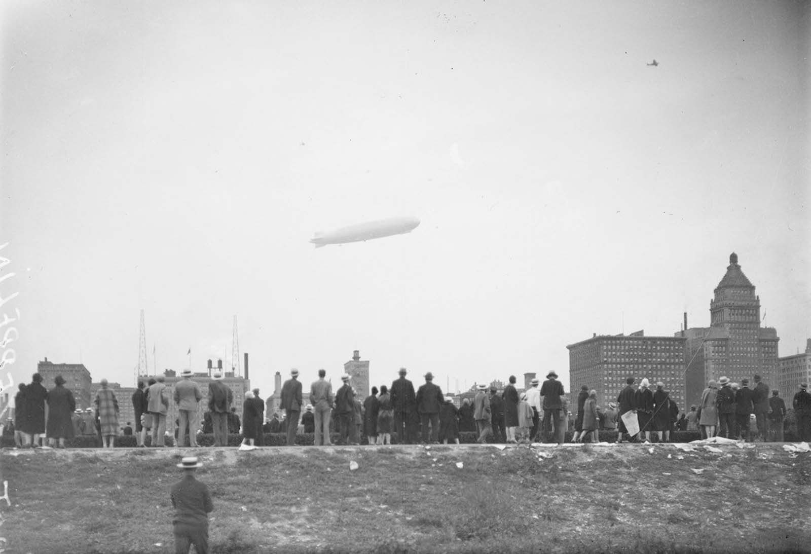 The Graf Zeppelin viewed at an angle flying over the Loop community area of Chicago.