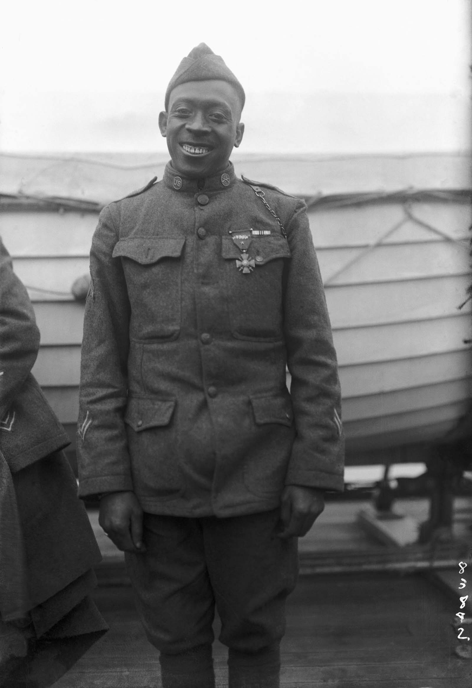 Sgt. Henry Johnson of the 369th poses wearing the Cross of War, awarded for bravery in an outnumbered battle against German forces.