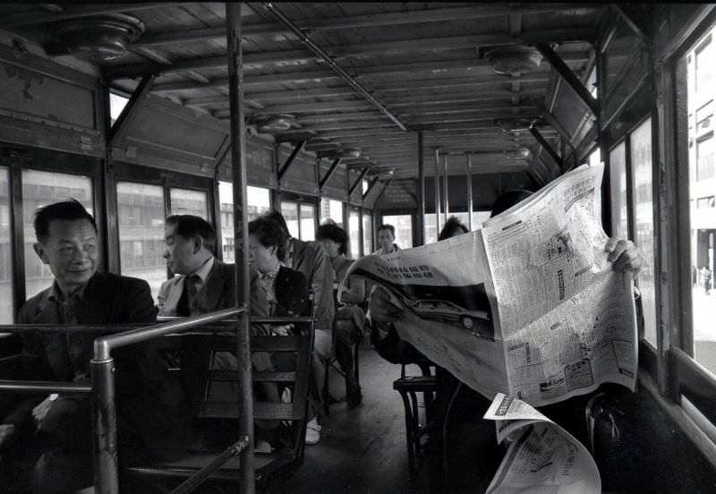 Passengers on the tram, Queen's Road, Hong Kong, 1986