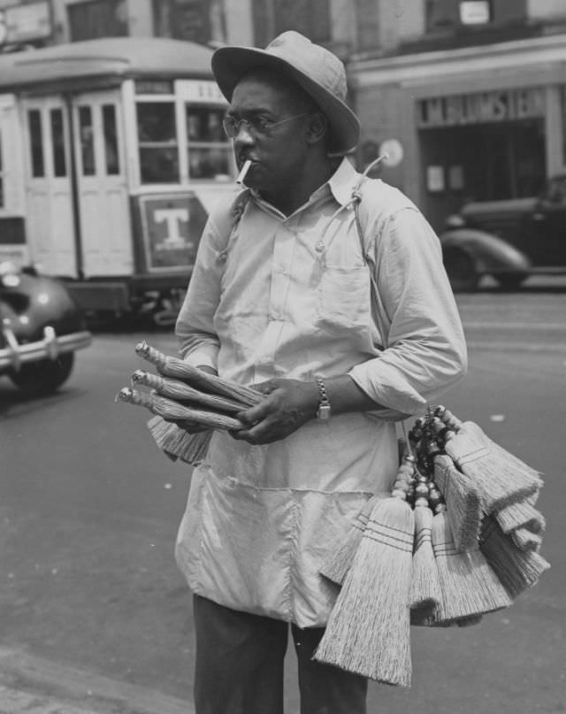 Whisk broom salesman, 125th Street, Harlem, 1946