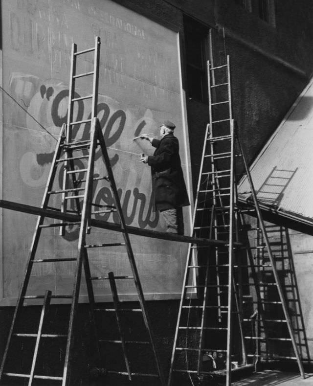Times Square sign painter, 1946