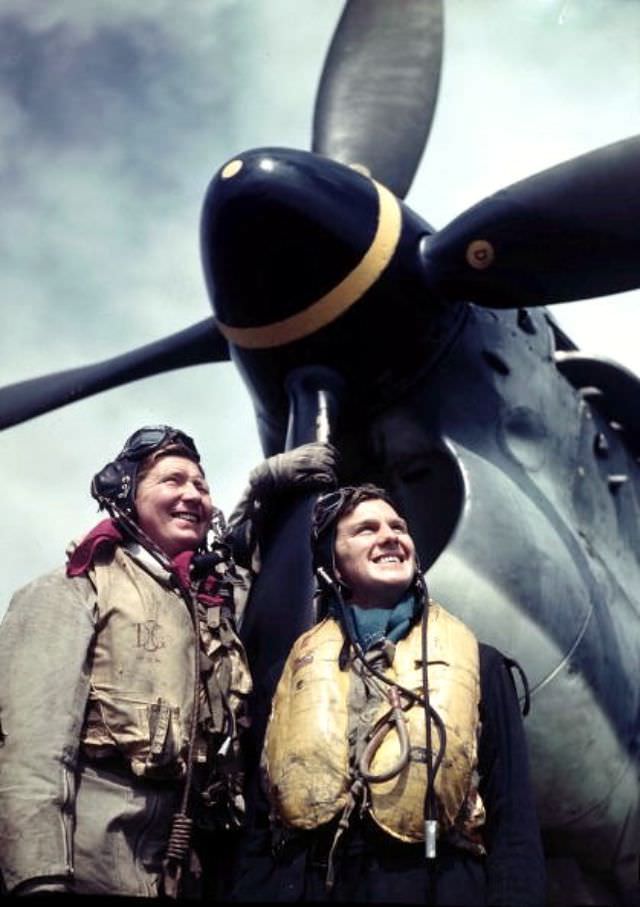 Two training Barracuda Bomber Pilots standing next to their aircraft, July 1944