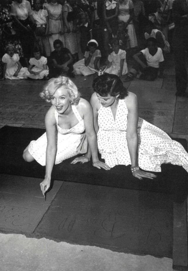 Marilyn Monroe and Jane Russell at Their Imprint Ceremony at Grauman’s Chinese Theatre in 1953