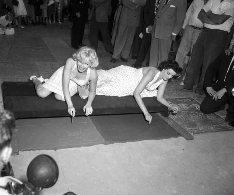 Marilyn Monroe and Jane Russell at Their Imprint Ceremony at Grauman’s Chinese Theatre in 1953