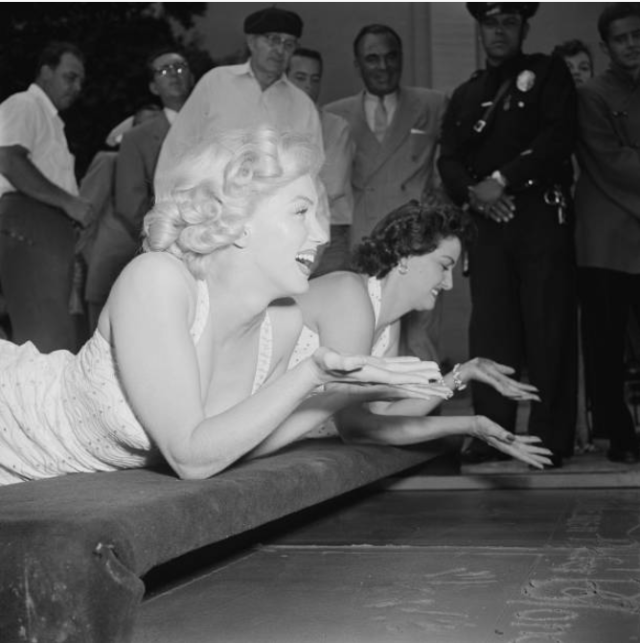 Marilyn Monroe and Jane Russell at Their Imprint Ceremony at Grauman’s Chinese Theatre in 1953