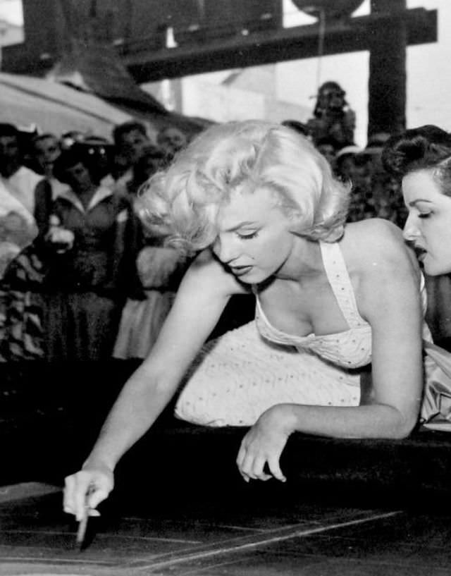 Marilyn Monroe and Jane Russell at Their Imprint Ceremony at Grauman’s Chinese Theatre in 1953