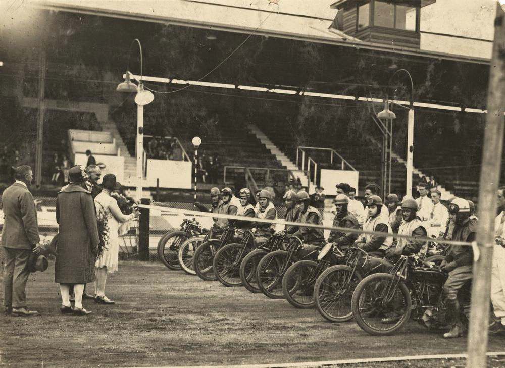 Officials cutting the starting ribbon at a speedway motorcycle race in Brisbane, 1930.