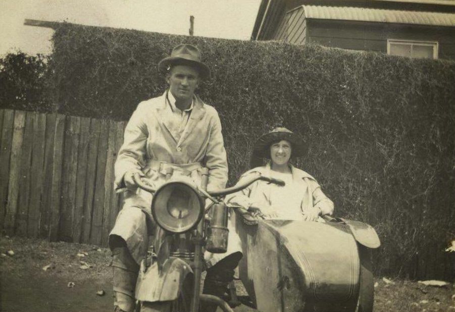 Motorbike and sidecar with rider and passenger, 1922.