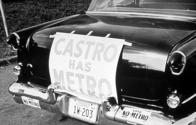 Sign protesting Metro Consolidation, 1962