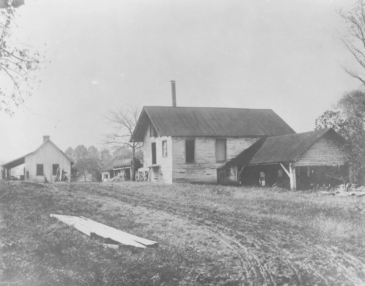 Exterior view of Old Mill and Blacksmith shop at Belle Meade Plantation, 1950s