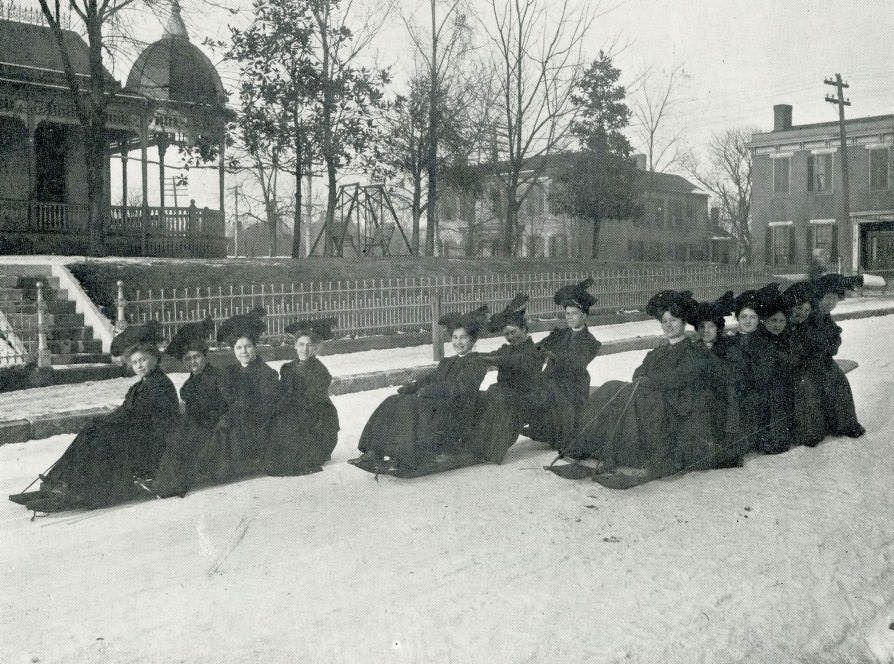 Seniors of Boscobel College for Young Ladies “coasting” on bobsleds in the snow, 1907