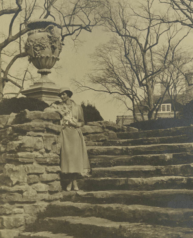 Woman standing on the steps of the Cheekwood mansion grounds in Nashville, Tennessee, 1941