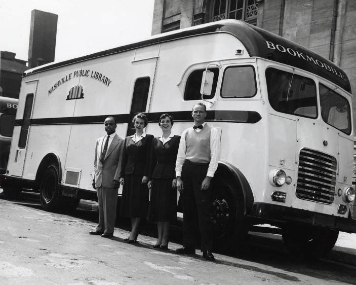 Staff members in front of a Nashville Public Library bookmobile, 1955