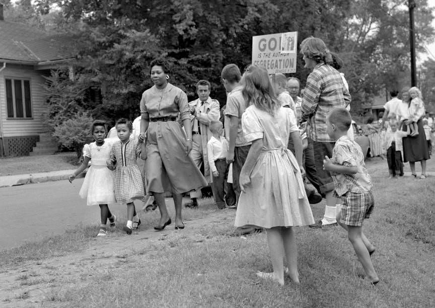 Grace McKinley walking her daughter, Linda Gail McKinley to Fehr Elementary School, Nashville, 1957