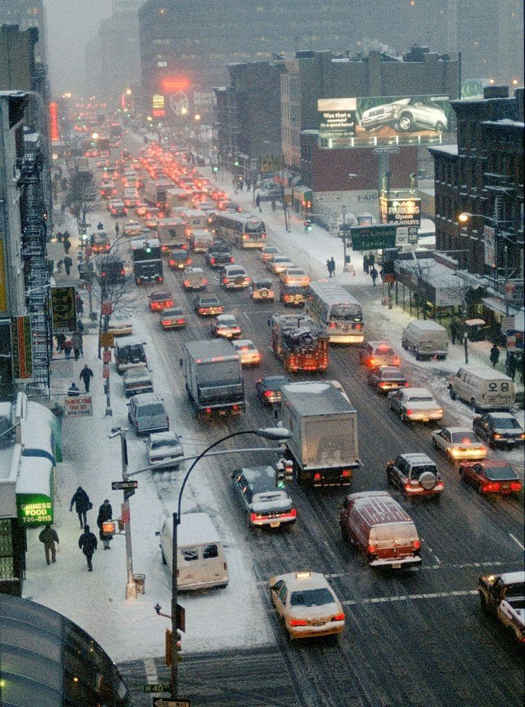 Traffic heading down Ninth Ave. after a snow storm which complicated the evening commute.