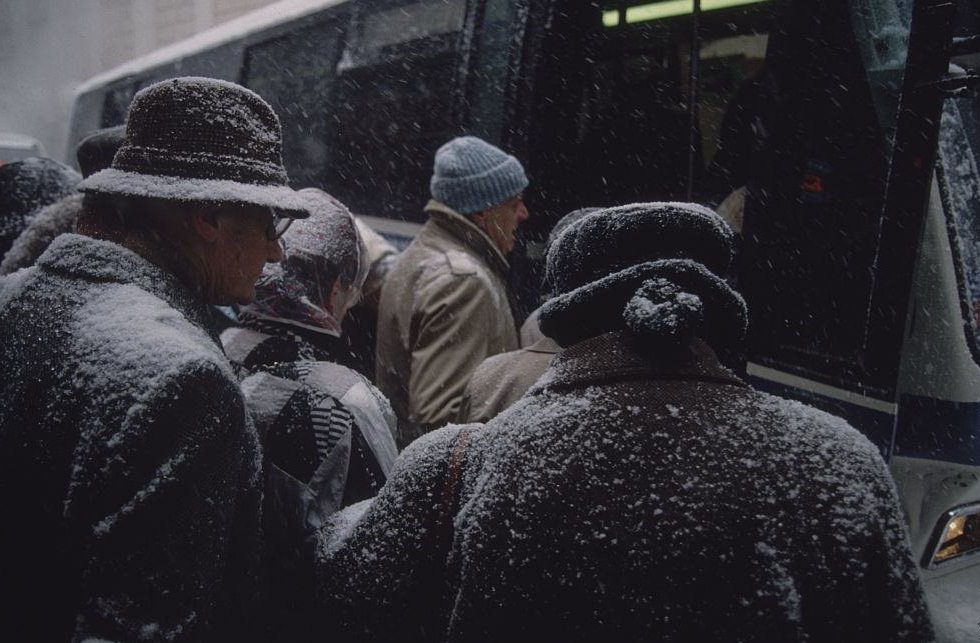 Snow-Covered People Boarding Bus During Snowstorm, New York City, 1996