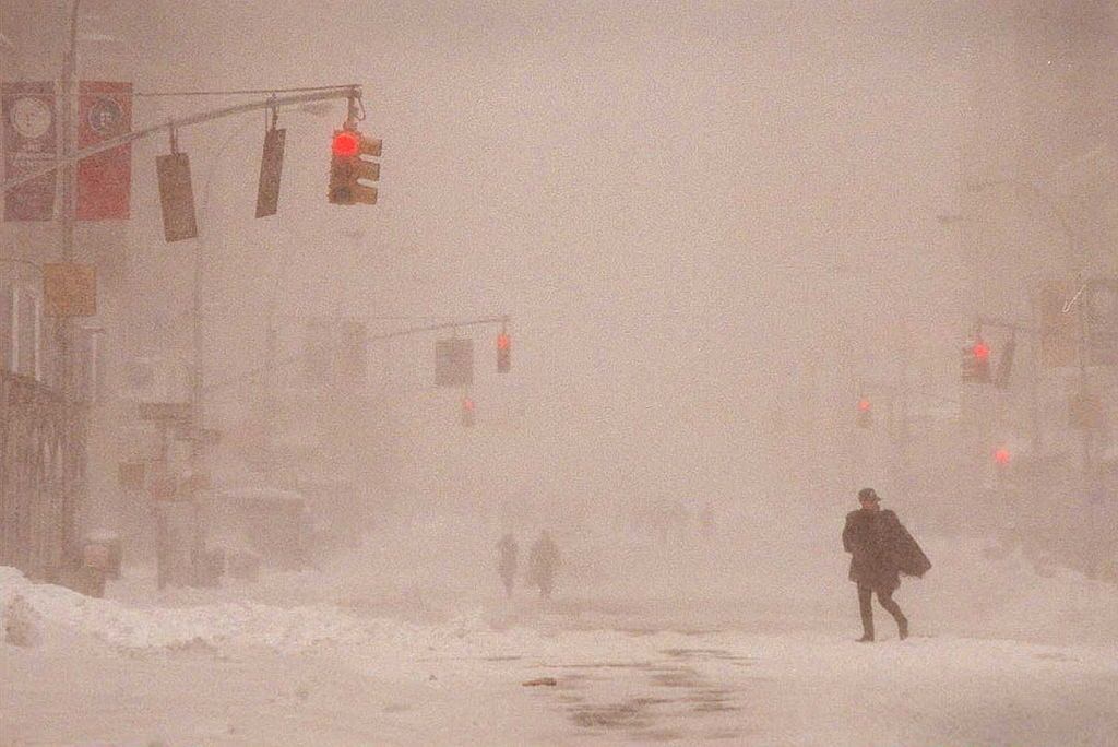 A New Yorker makes her way down Seventh Avenue in Manhattan.