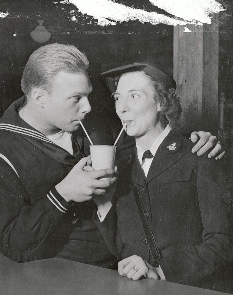 Reunited Husband and Wife Sharing Soda, 1944
