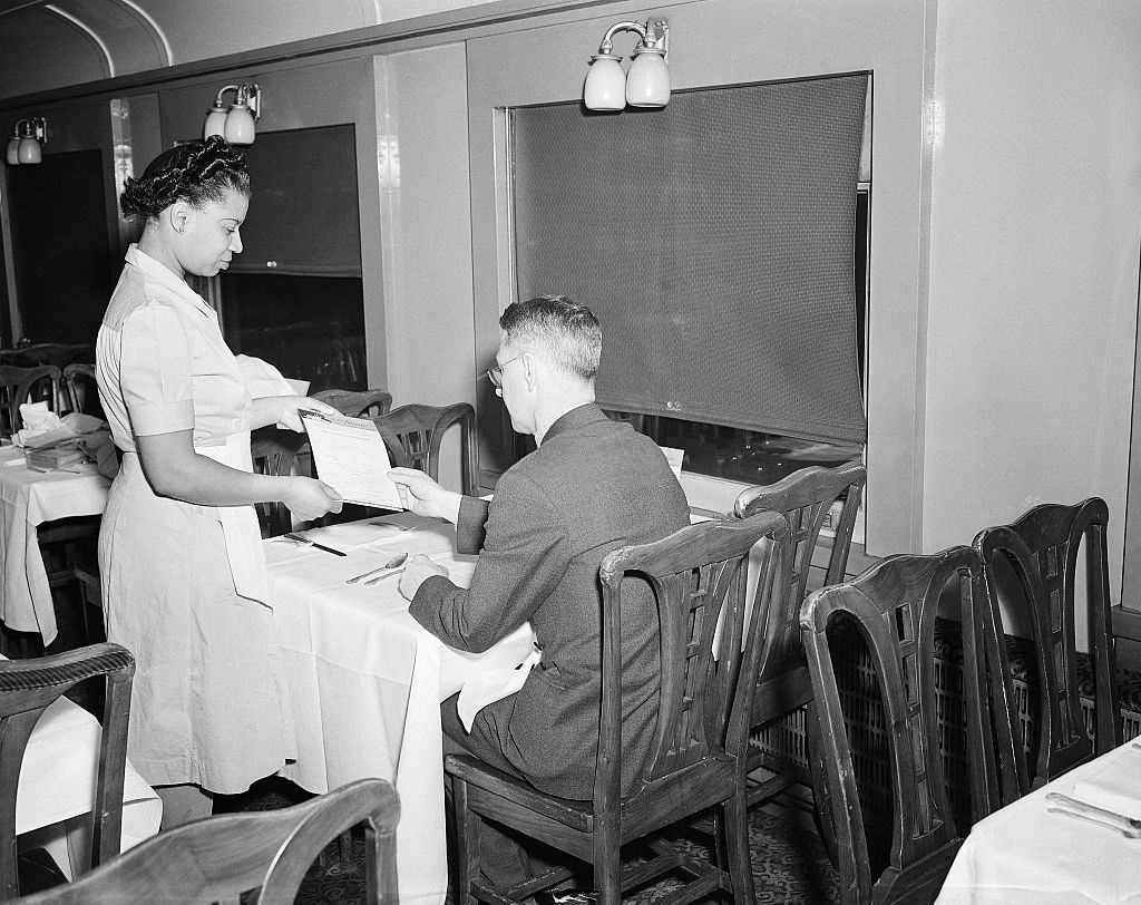 Waitress Presenting a Menu, 1943