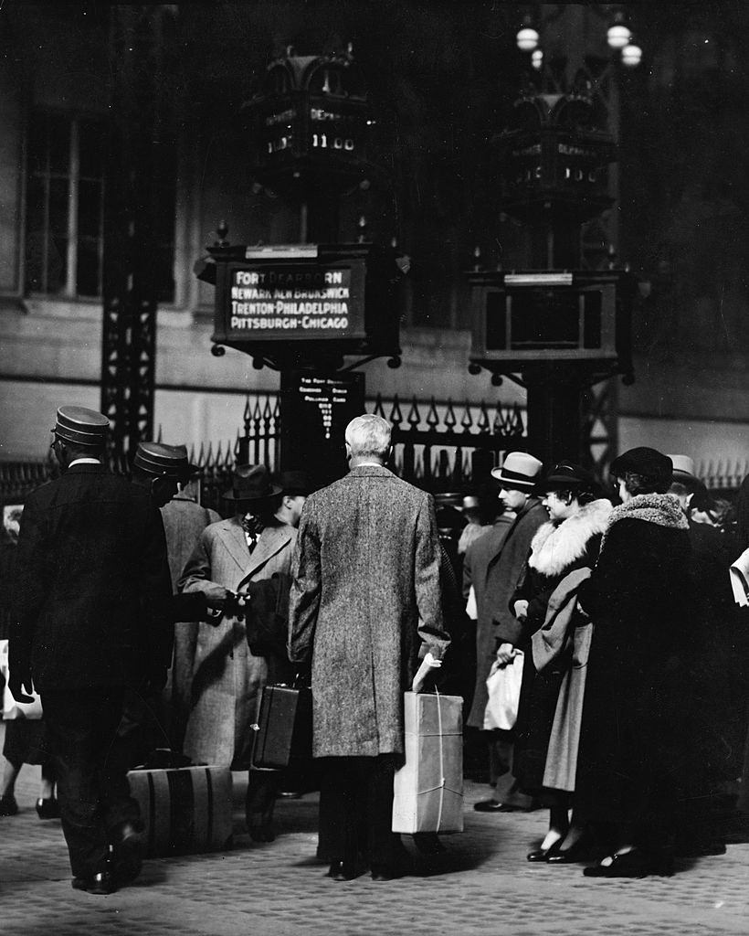 Commuters wait for the train at Penn Station, New York, early 1940s.