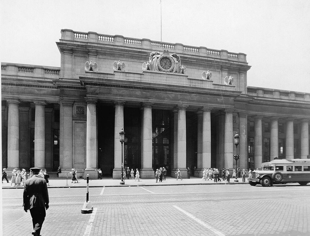 View of the front facade of Pennsylvania Station, New York, mid 1930s.