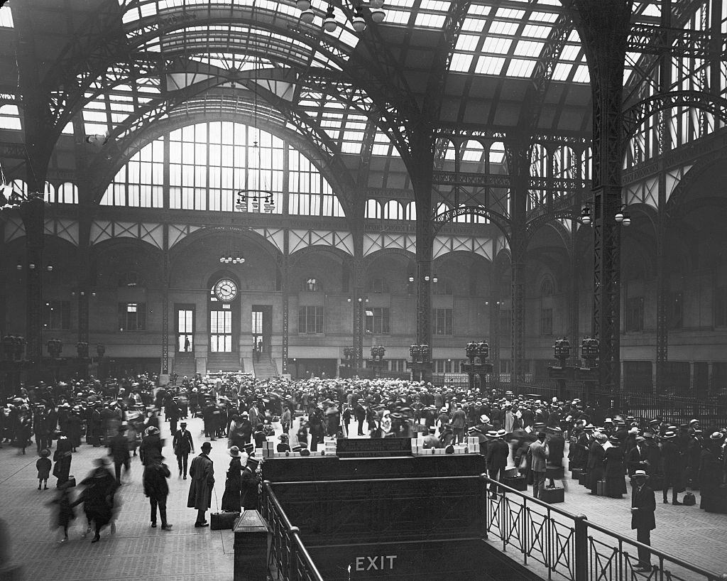 Commuters crowd the terminal of Pennsylvania Station, preparing to leave town for the holidays, New York City.