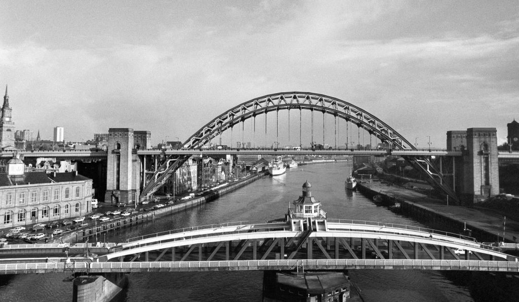 A view from the high level bridge, looking over the Swing Bridge to the Tyne Bridge.