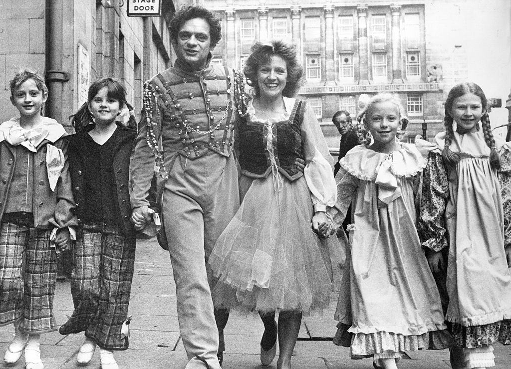 David Jason and Leah Bell who are in the pantomime Cinderella at the Theatre Royal, Newcastle with four of the choldren, 1970s