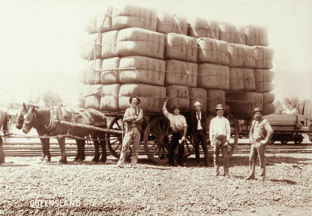 Bales of wool from Claverton Station loaded on dray with workers nearby, 1897