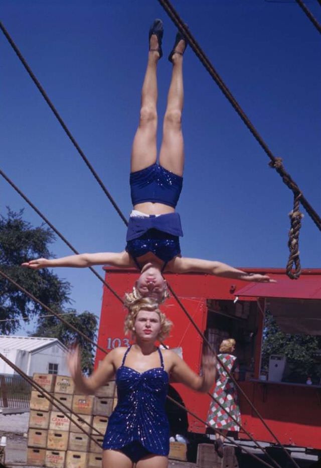 Two young German girls in head-on-head balancing act