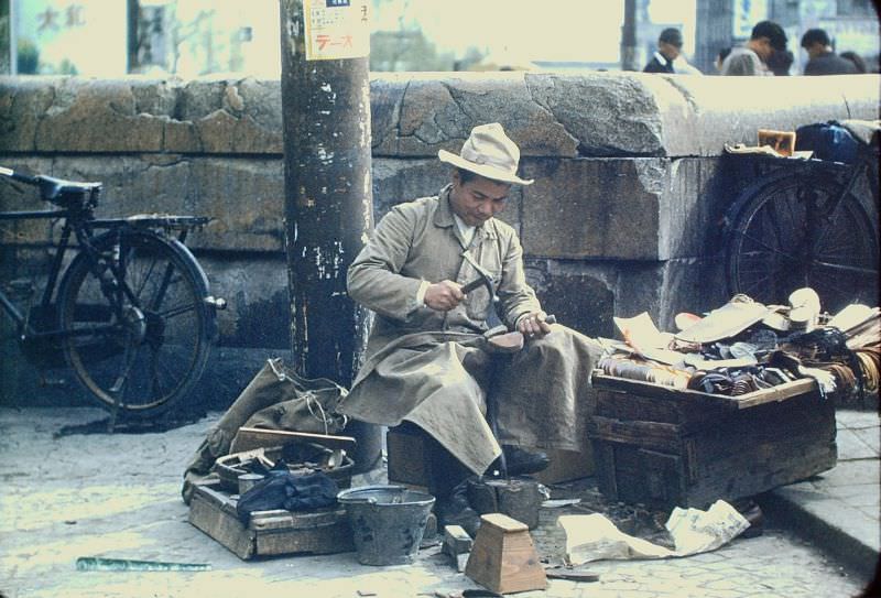 Tokyo. A cobbler and all his things, 1950