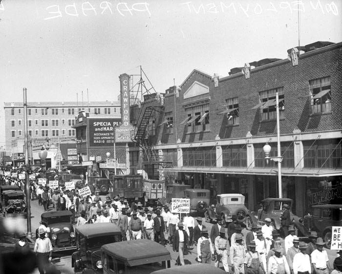Parade of unemployed workers, on W. Houston Street, on way to City Hall, San Antonio, 1930s