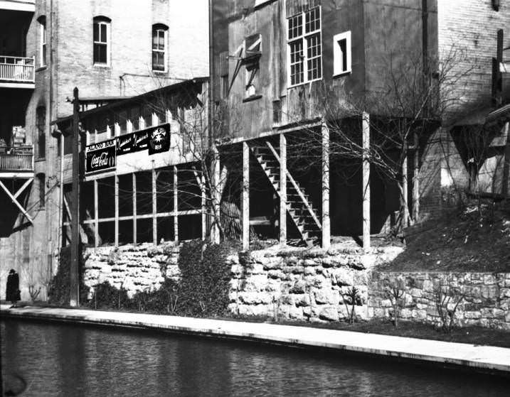 The San Antonio River and the back of buildings that front on Alamo Street, 1930