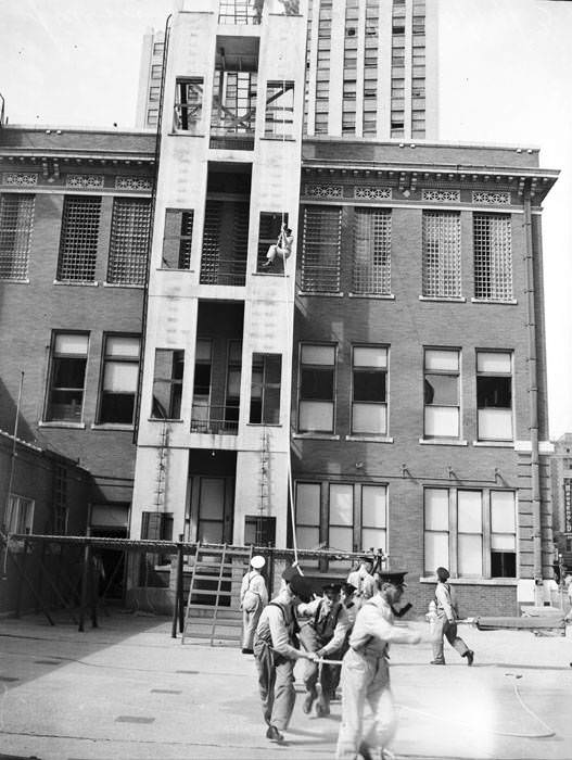 San Antonio firemen in drills at Central Fire Station, 1937