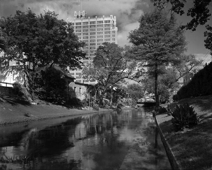 San Antonio River looking downstream toward the Navarro Street Bridge on the upper arm of the river bend, 1938